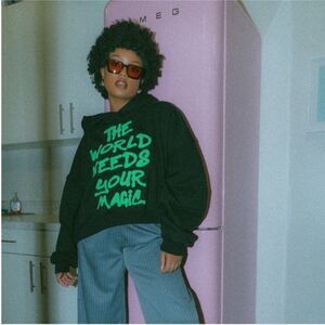 Dressed in LALA Energy Doesn't Lie Cropped Hoodie in The World Needs Your Magic